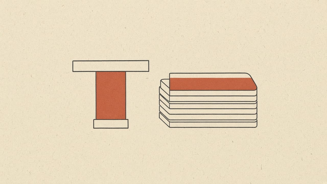 Geometric gavel block and document stack on warm paper